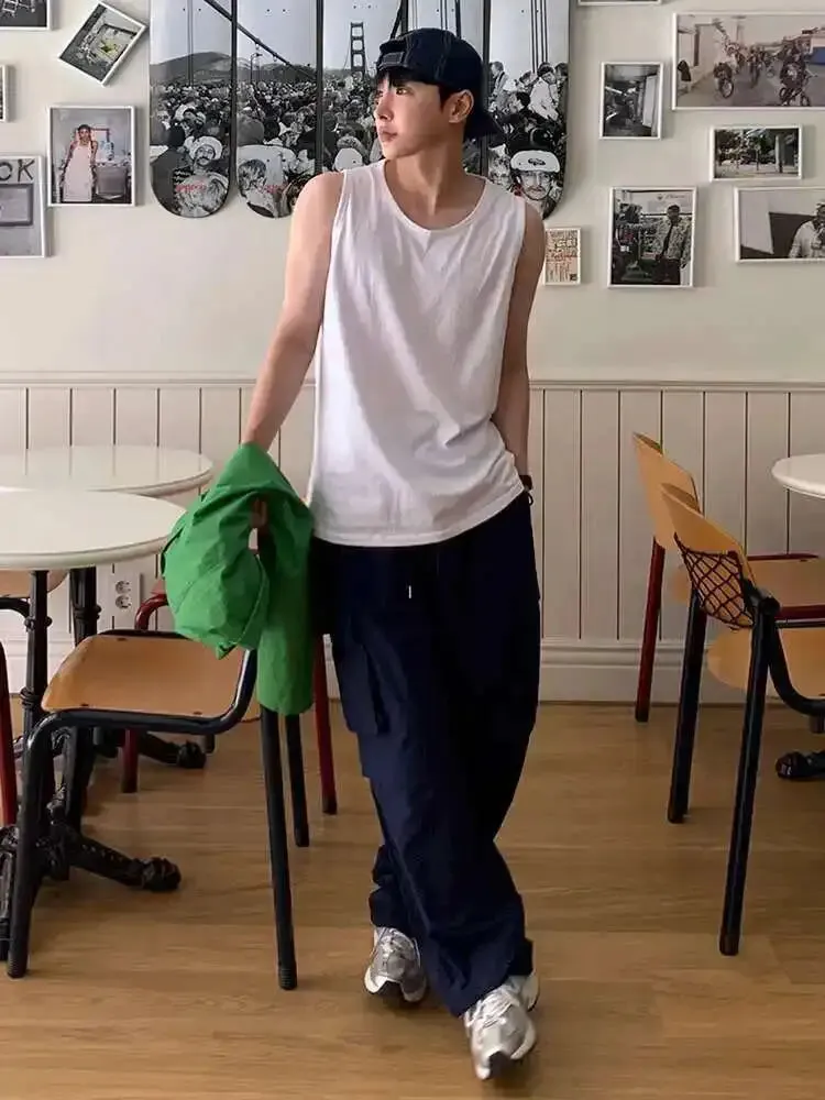 ADVBRIDGE  -  Men's T-shirts Sleeveless 2025 Summer Niche Design Loose Round Neck Trendy Solid Color Simple Male Clothing Tank Tops