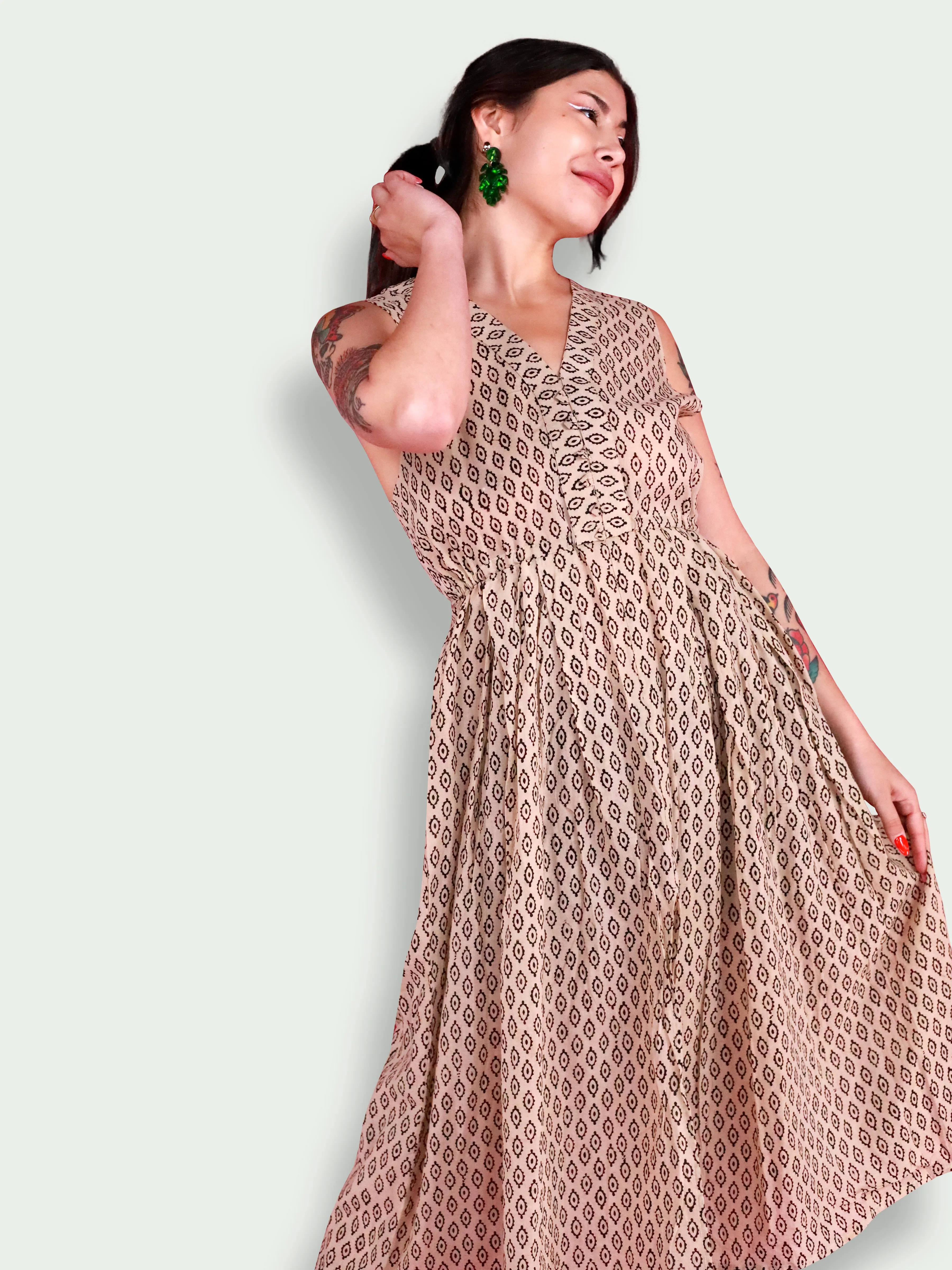 Almond Eyes Sleeveless Tunic