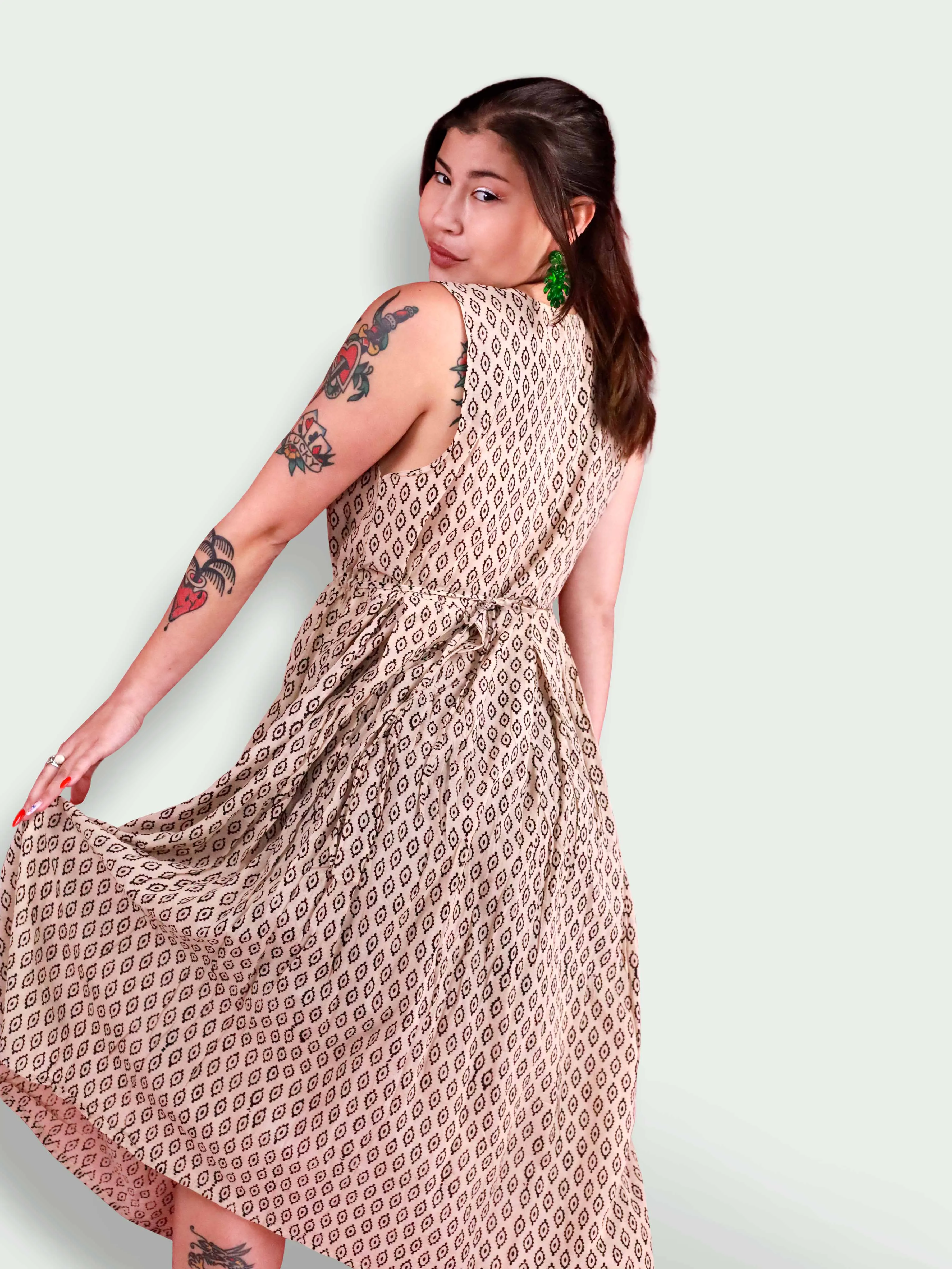Almond Eyes Sleeveless Tunic