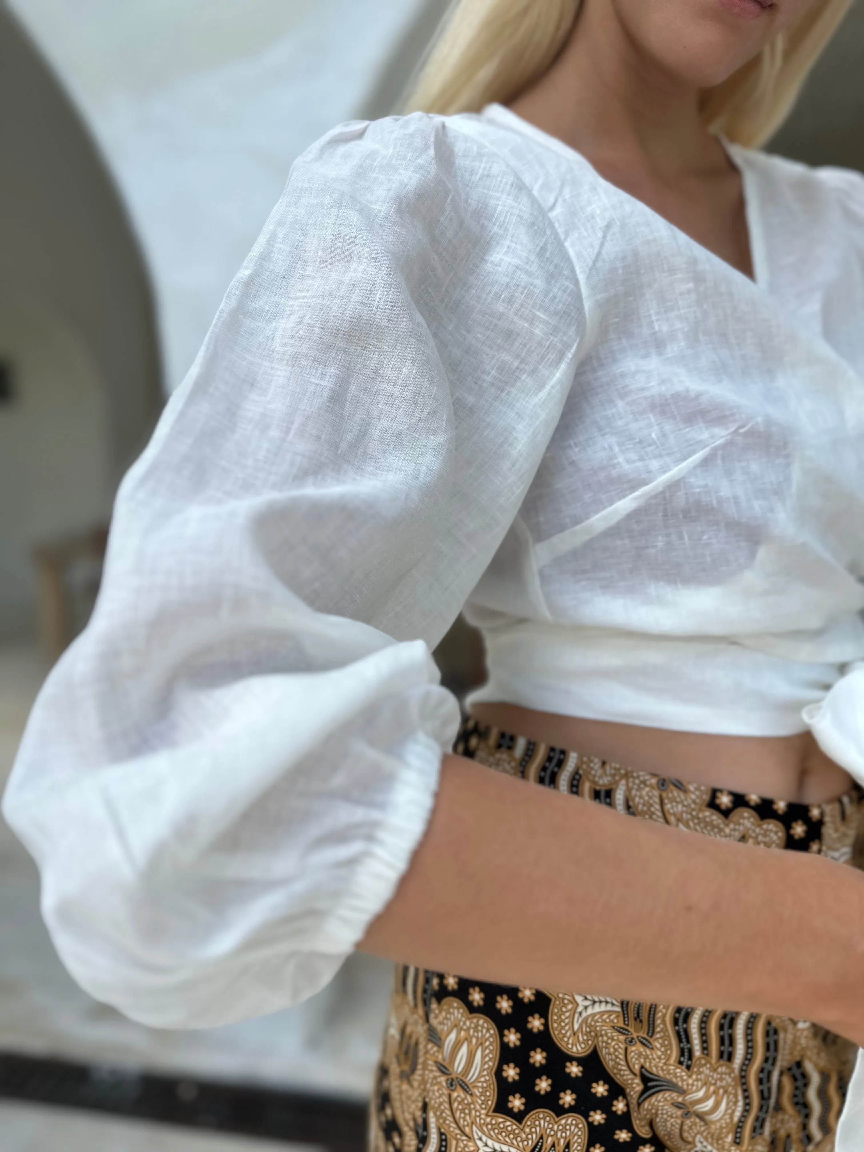 Mykonos Wrap Blouse in off white linen.