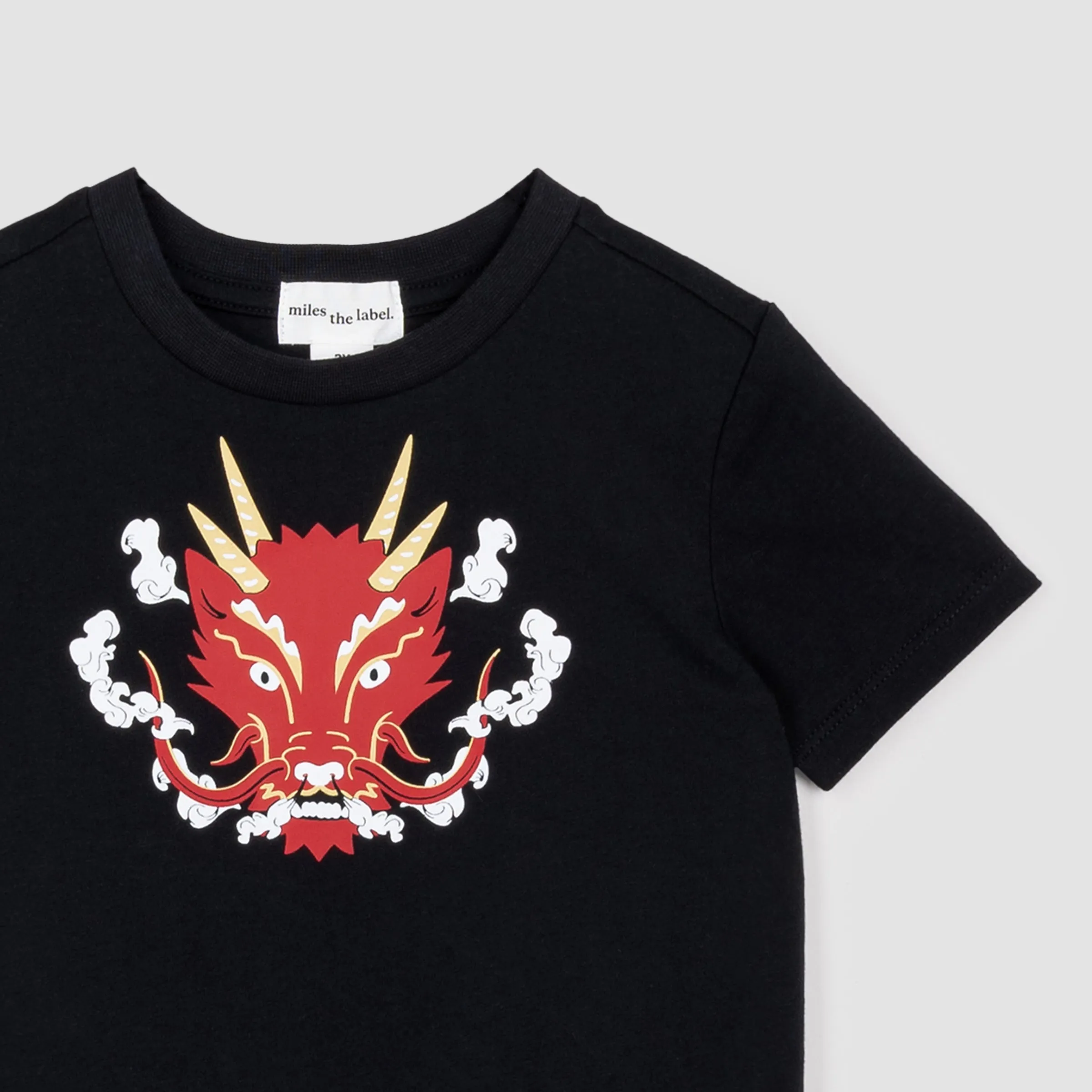 T-shirt noir à imprimé de tête de dragon